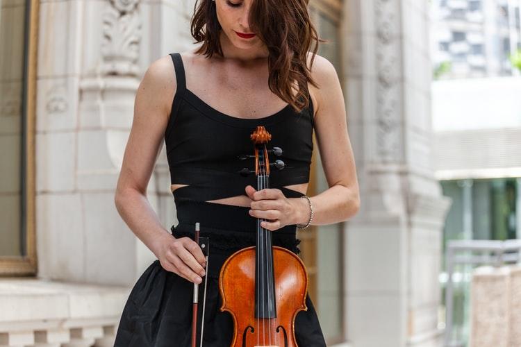 Woman holding a violin