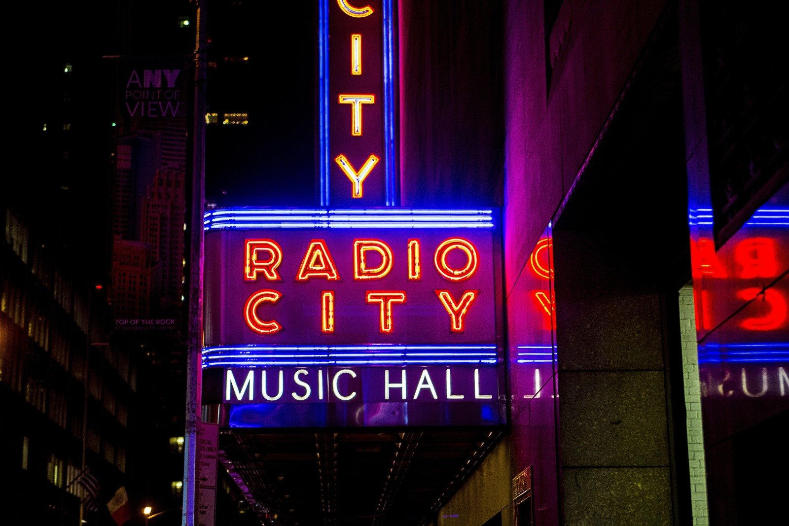 Radio City Music Hall neon sign lit up at night