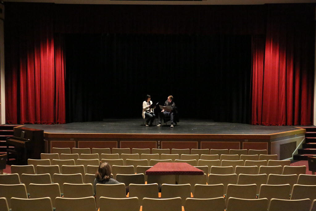 two people auditioning on stage