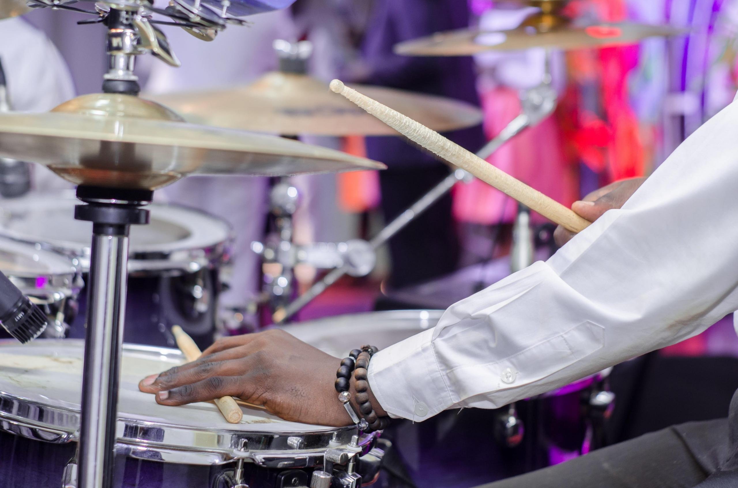 holding drum sticks