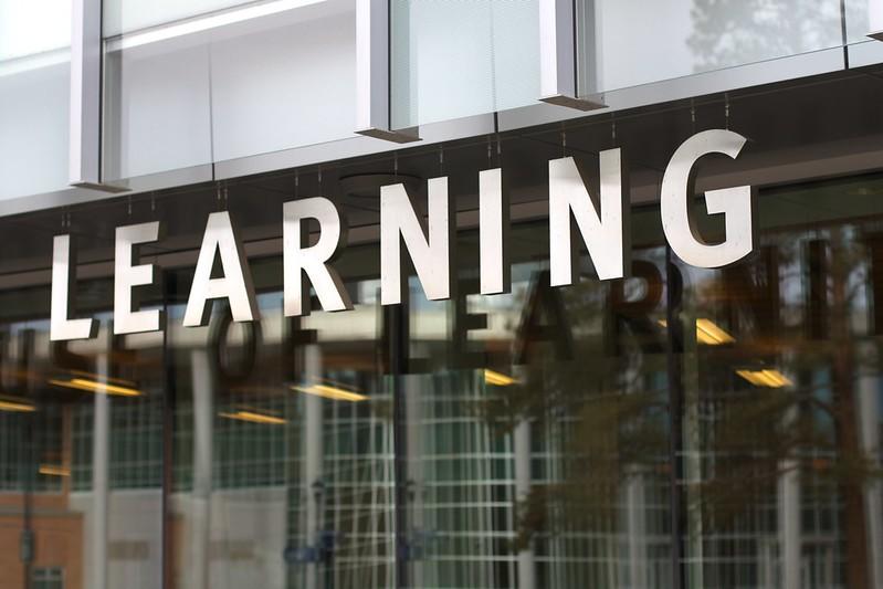 A sign reads 'learning'.