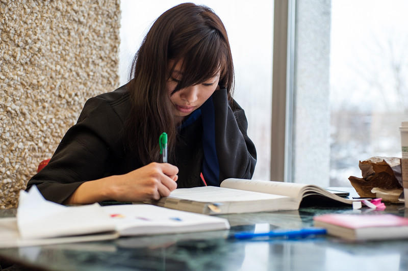 A student studies in a local library.