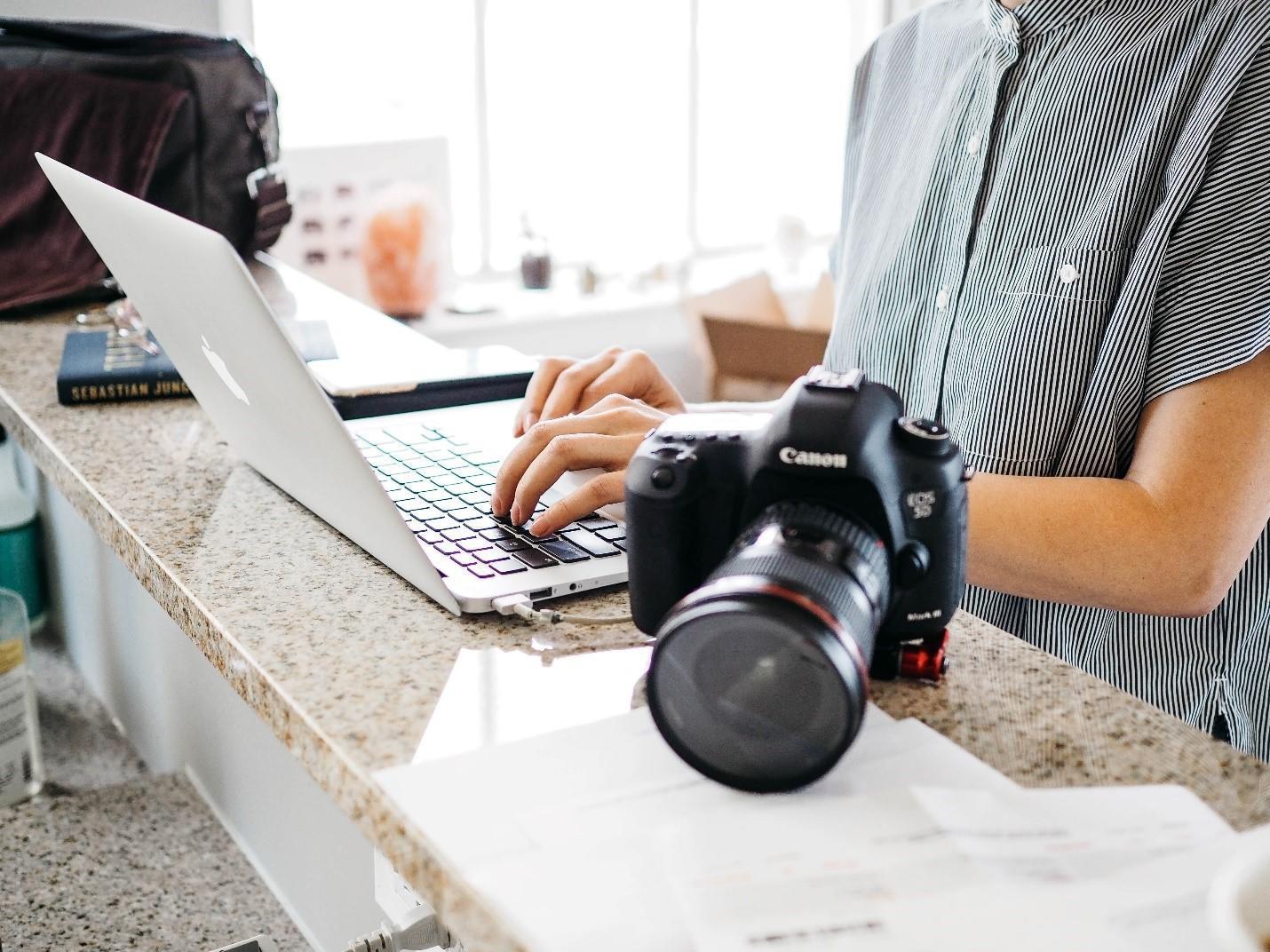 Critically reviewing images' angles and composition in a photography class