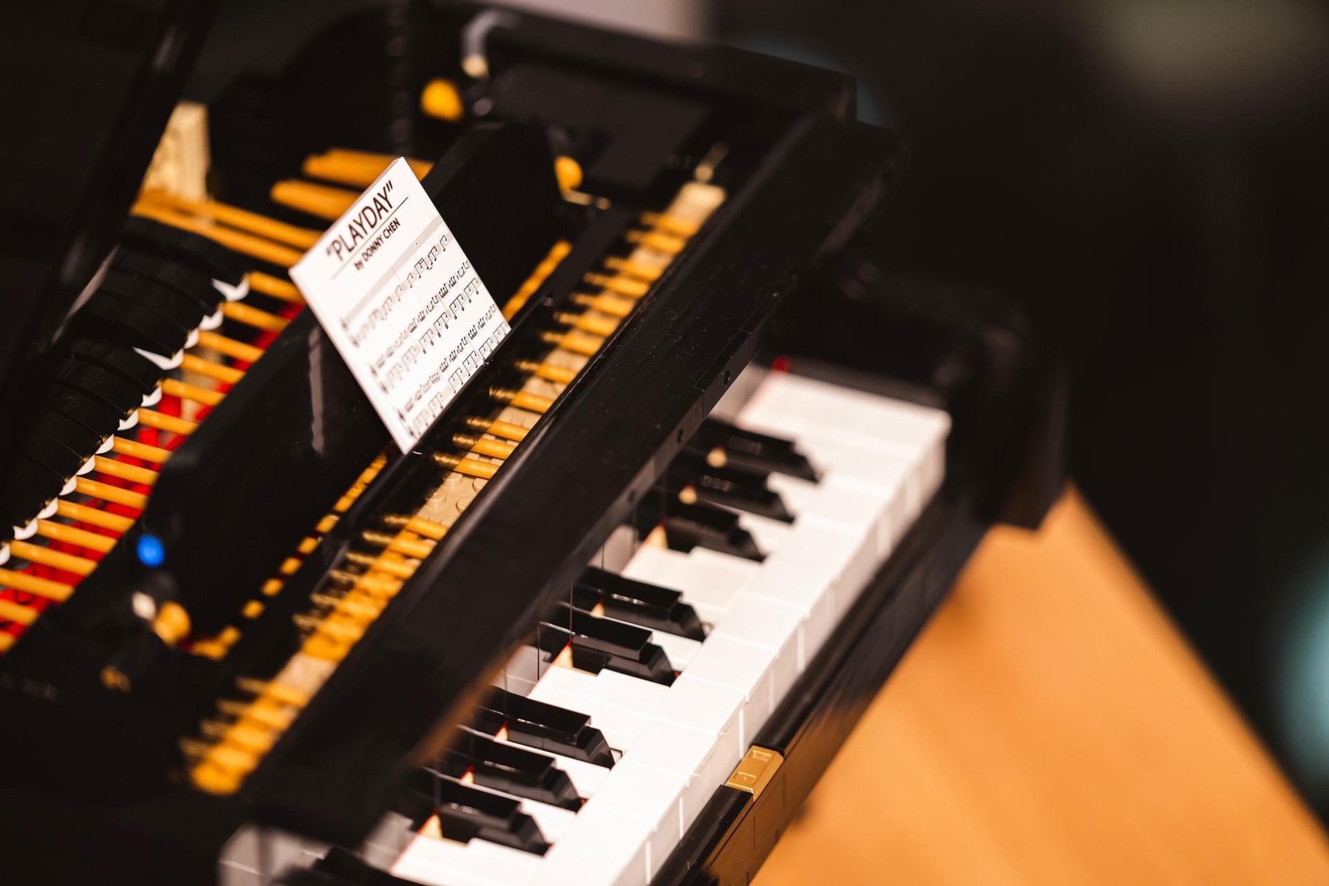 finders on a piano keyboard close-up