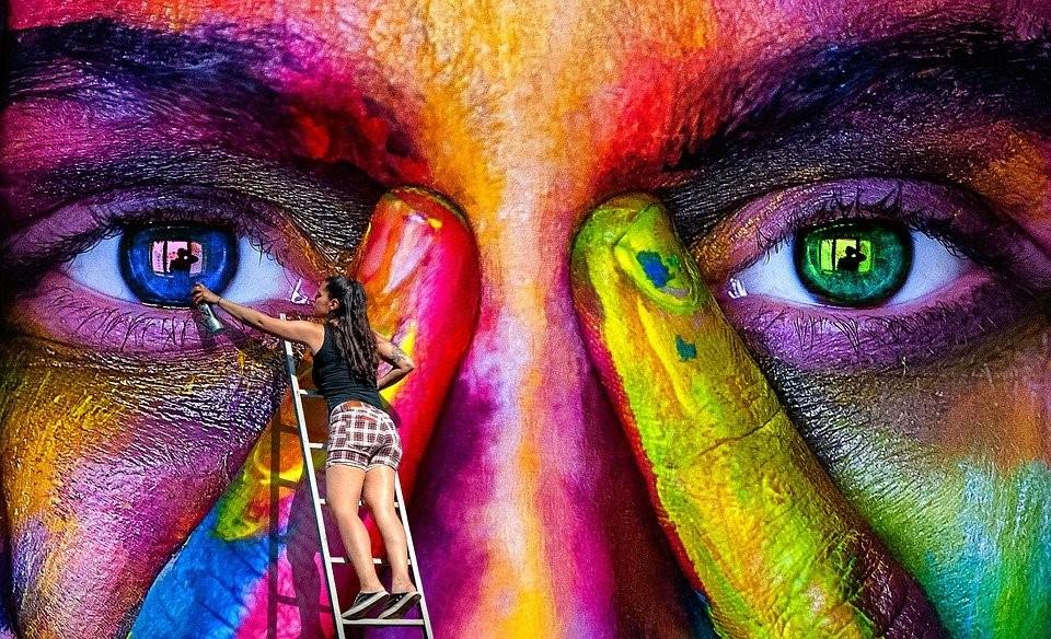 An abstract artwork representing a human face with two index fingers placed on the nose.