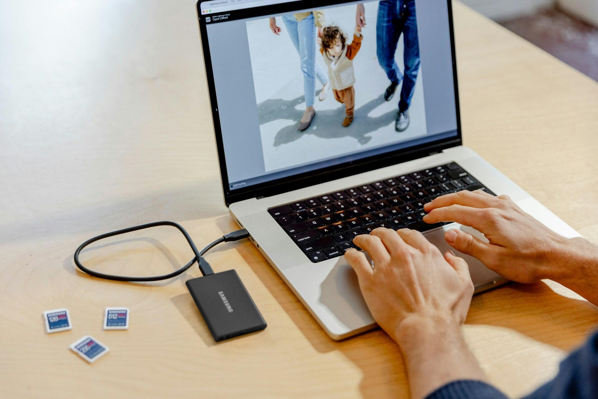 Photography work on a laptop.