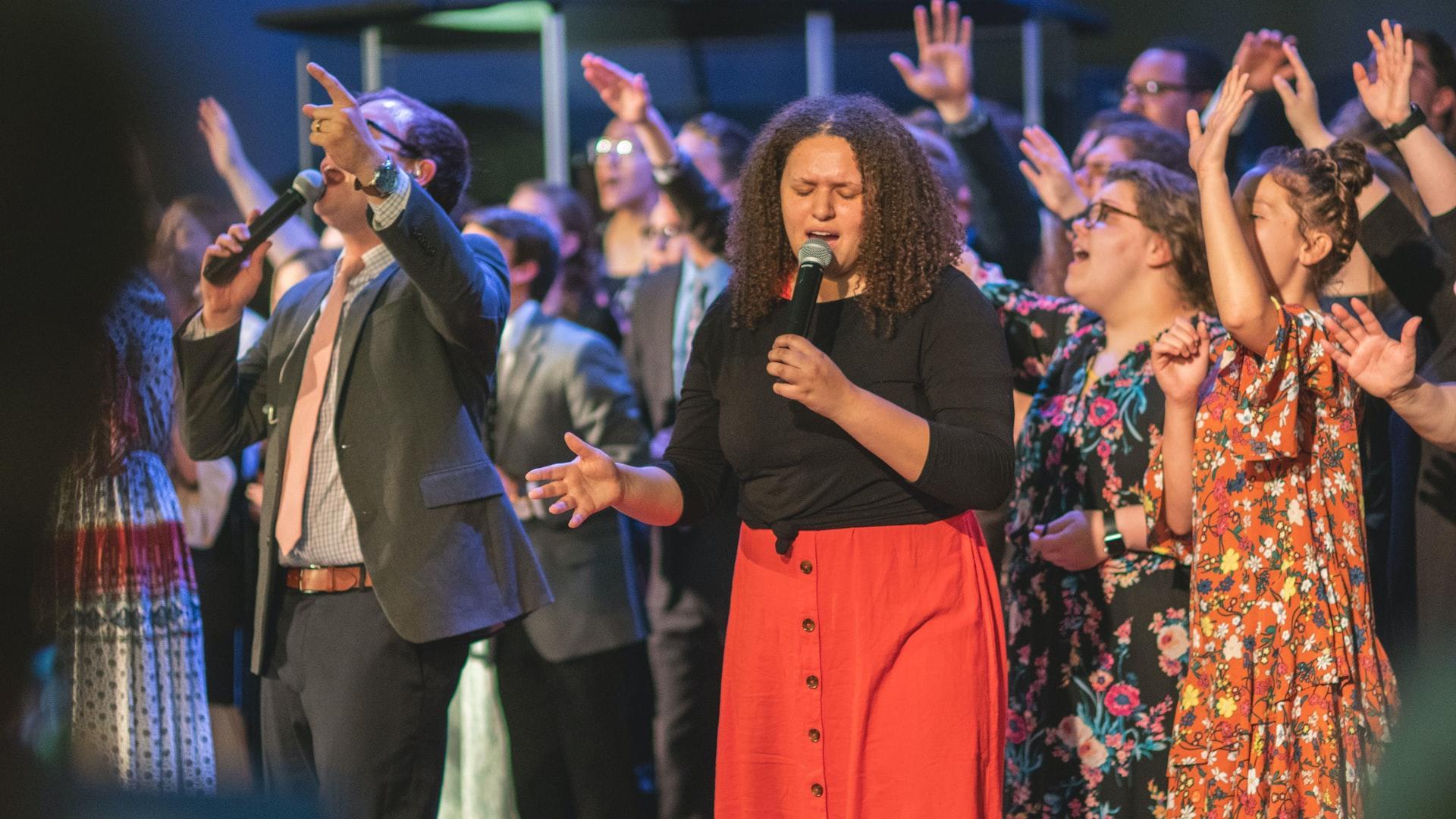 group of people singing together