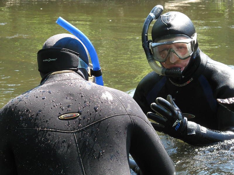 Marine Biologists collect a sample