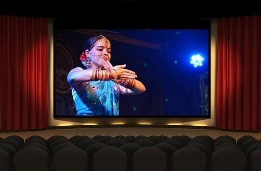 A screening of a Bollywood movie in the cinema. As the number of Hindi speakers increases globally, you can be sure to find cinemas showing popular Bollywood picks around the United States.