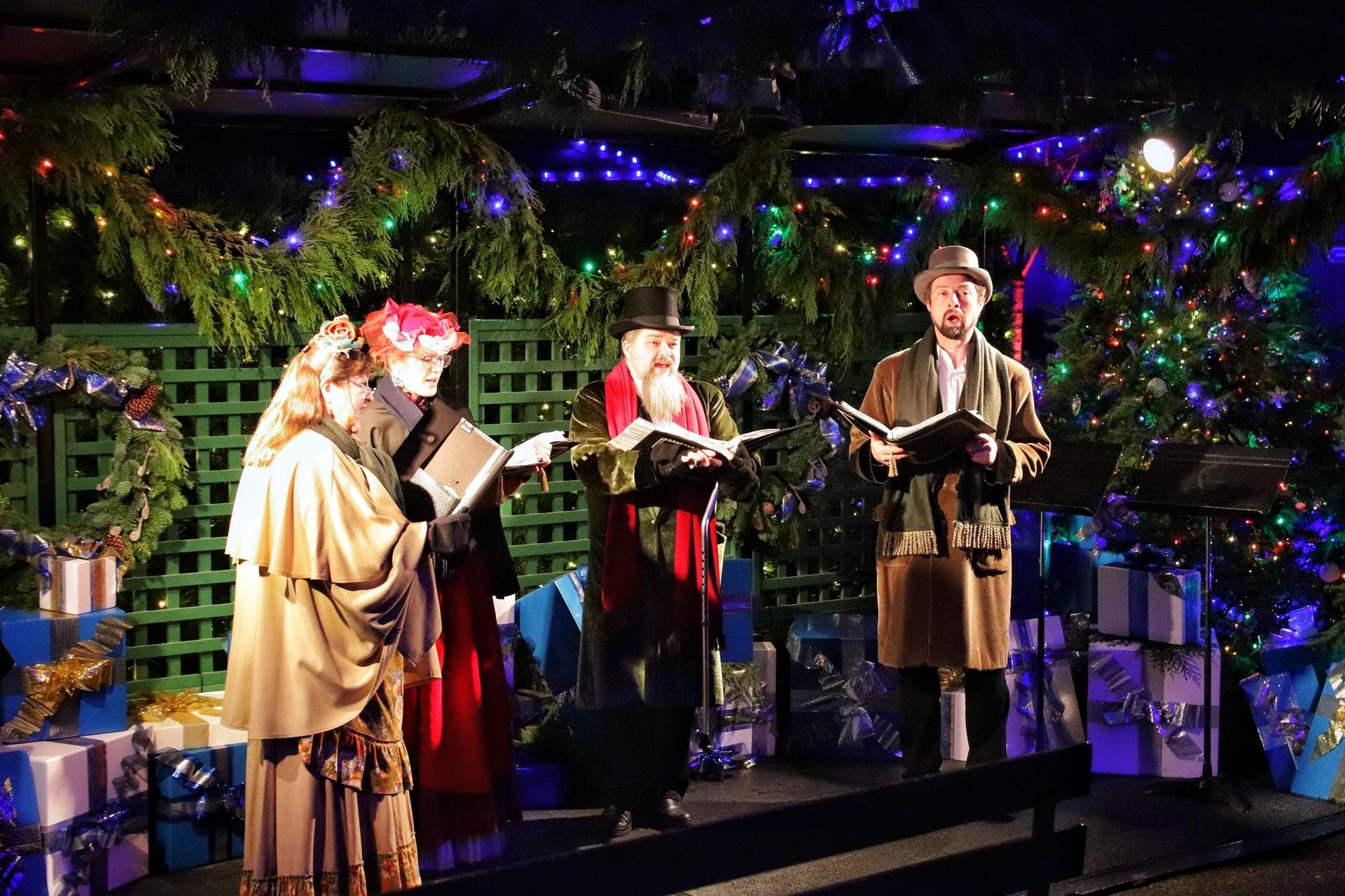 group in costume singing on stage
