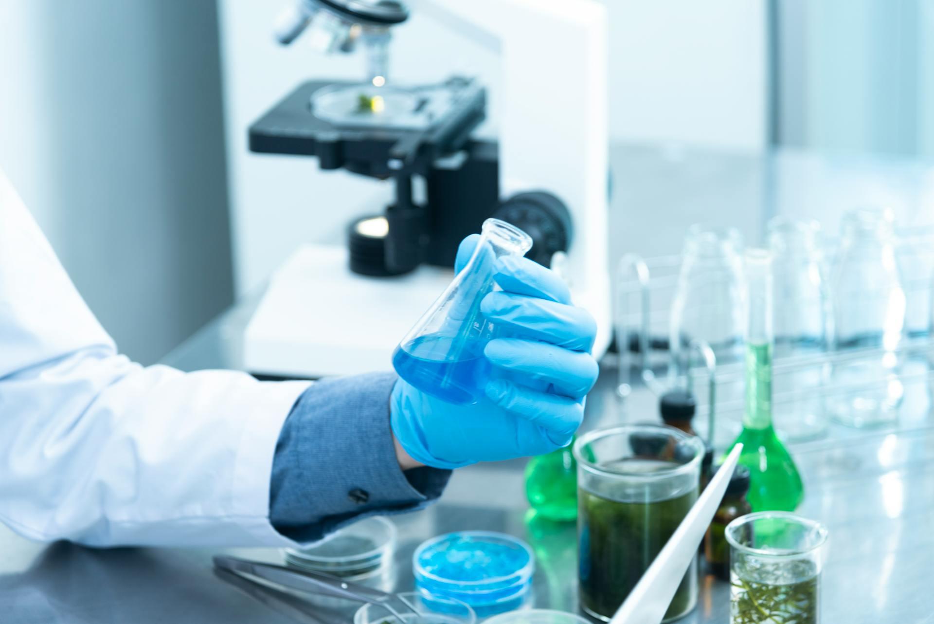 A biologist examining a test tube