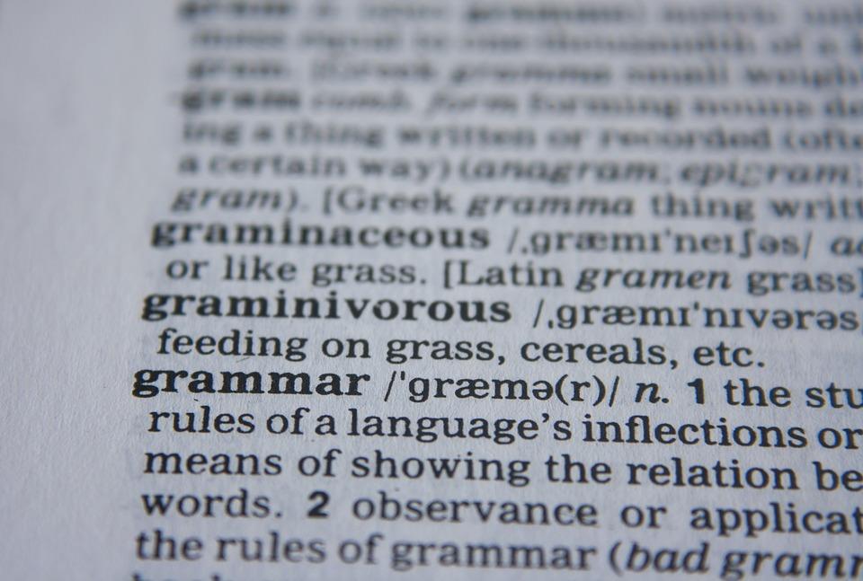 The definition of grammar focused in a dictionary. The ACT English exam focuses on multiple grammatical aspects to judge a candidate's skills regarding context, phrasing, and if they can communicate