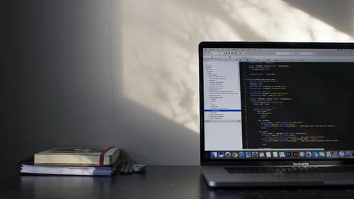 Books on the side of a laptop running a computer programming language. As attractive as a career in computer science may seem, it demands a lot of hard work, commitment, and sacrifices to become an expert