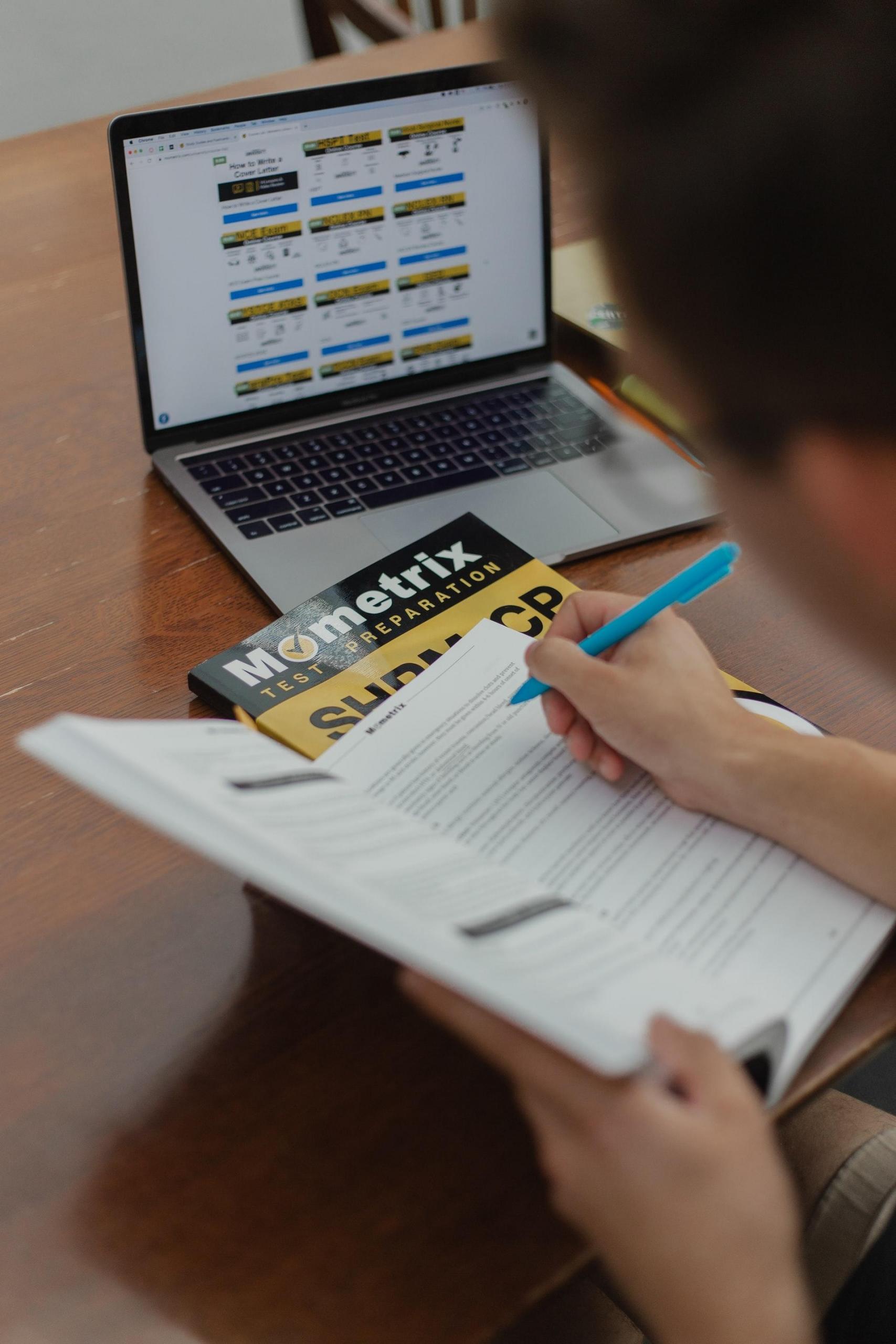Study with book and laptop