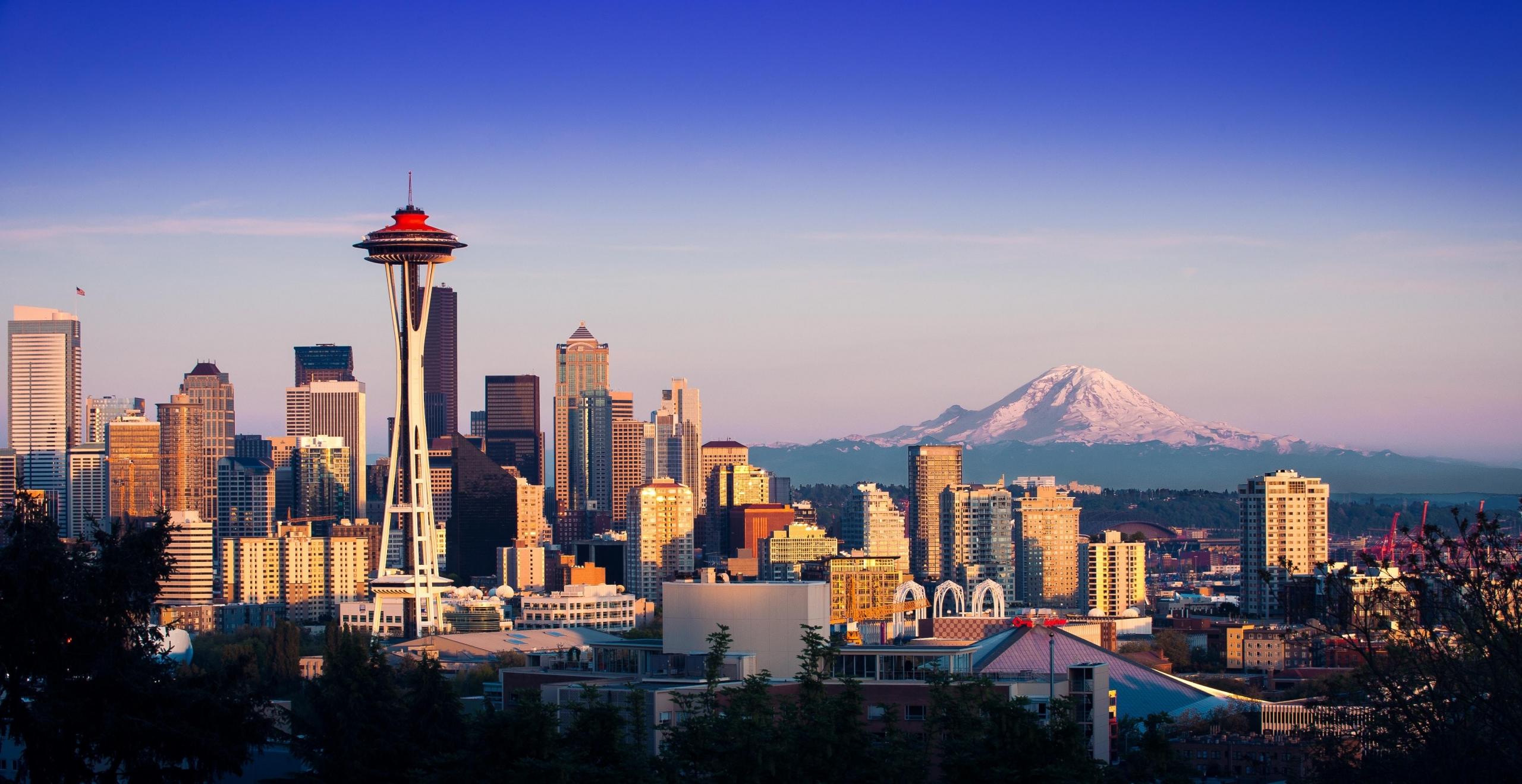 An aerial view of the Seattle metro area – the largest city of Washington – and home to America's best technological industries. Computer programmers find this place cheaper than Silicone Valley in terms of housing and services