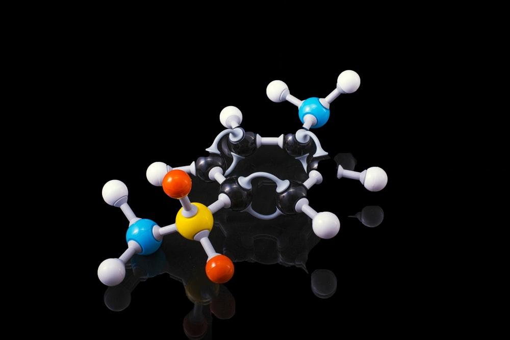 A 3D model of atoms combined together. Atoms make up the core of all matter, and each atom in an element has the same weight while atoms in different elements have varying weights. Chemistry is the study of how this happens and why