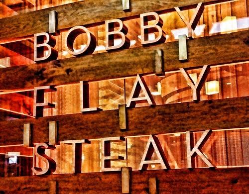 A signature wall design of Bobby Flay Steak. Bobby Flay's famous steakhouse is located at the Borgata Hotel in New Jersey. It offers a classic spin on his Southwestern style mixed with steakhouse fare