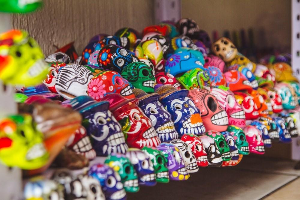 A set of colored toy skulls. Symbolic imagery like these skulls is a common feature in Mexico’s famous Dia de Los Muertos holiday. Join one of the best Spanish language schools in Mexico, and maybe you will get to visit a festival as a class field trip! 