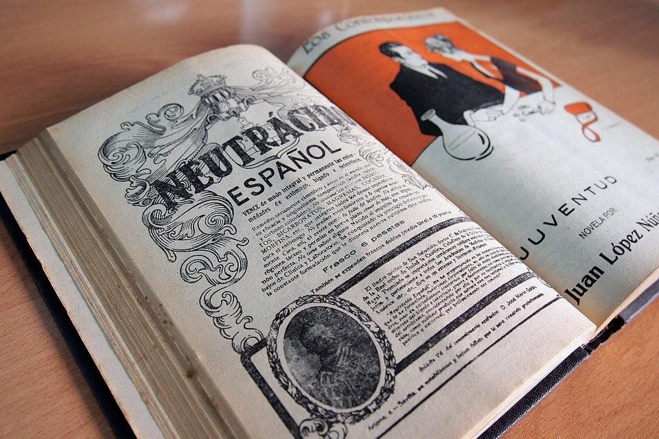 A Spanish book is open, displaying designs depicting 19th-century publishing style. Study Spanish in Mexico city and gain an authentic experience of some of the most unique museums you will visit in your lifetime.