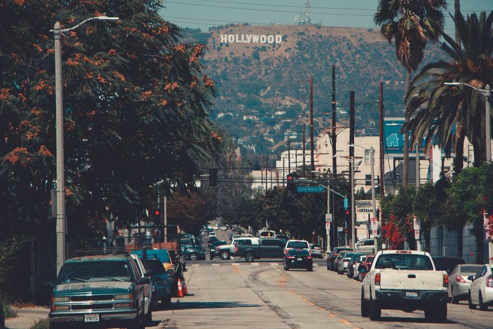 Busy streets of Los Angeles, in a fine afternoon with the legendary Hollywood hills in the background
