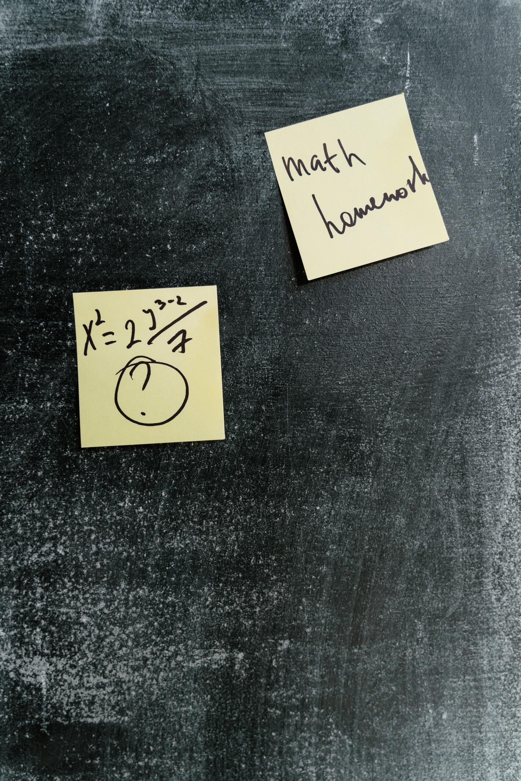 Practice equations are written down for students to solve