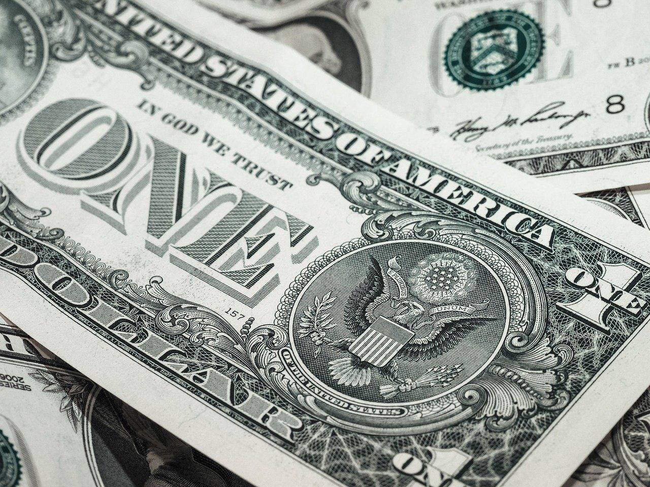 Scattered dollar bills