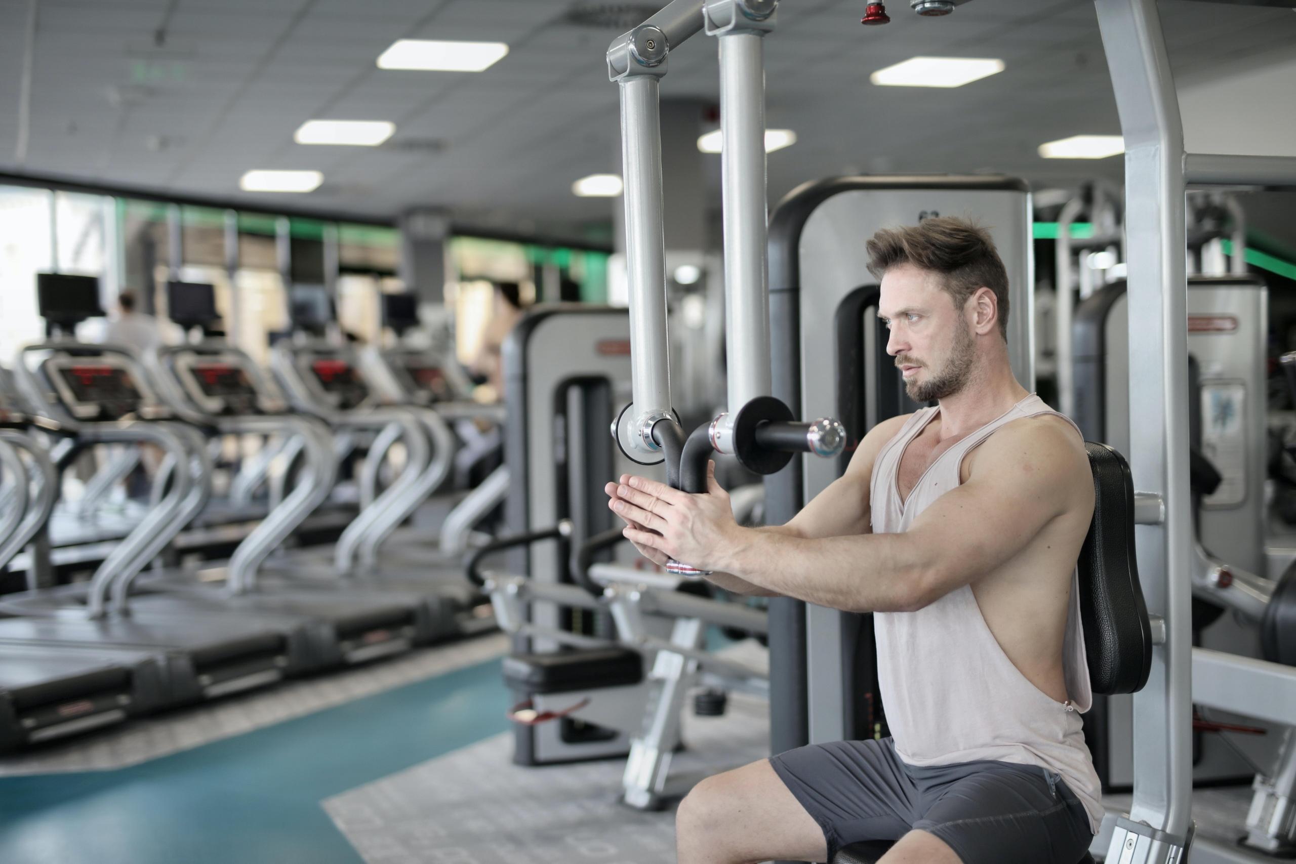 Man using machine at the gym