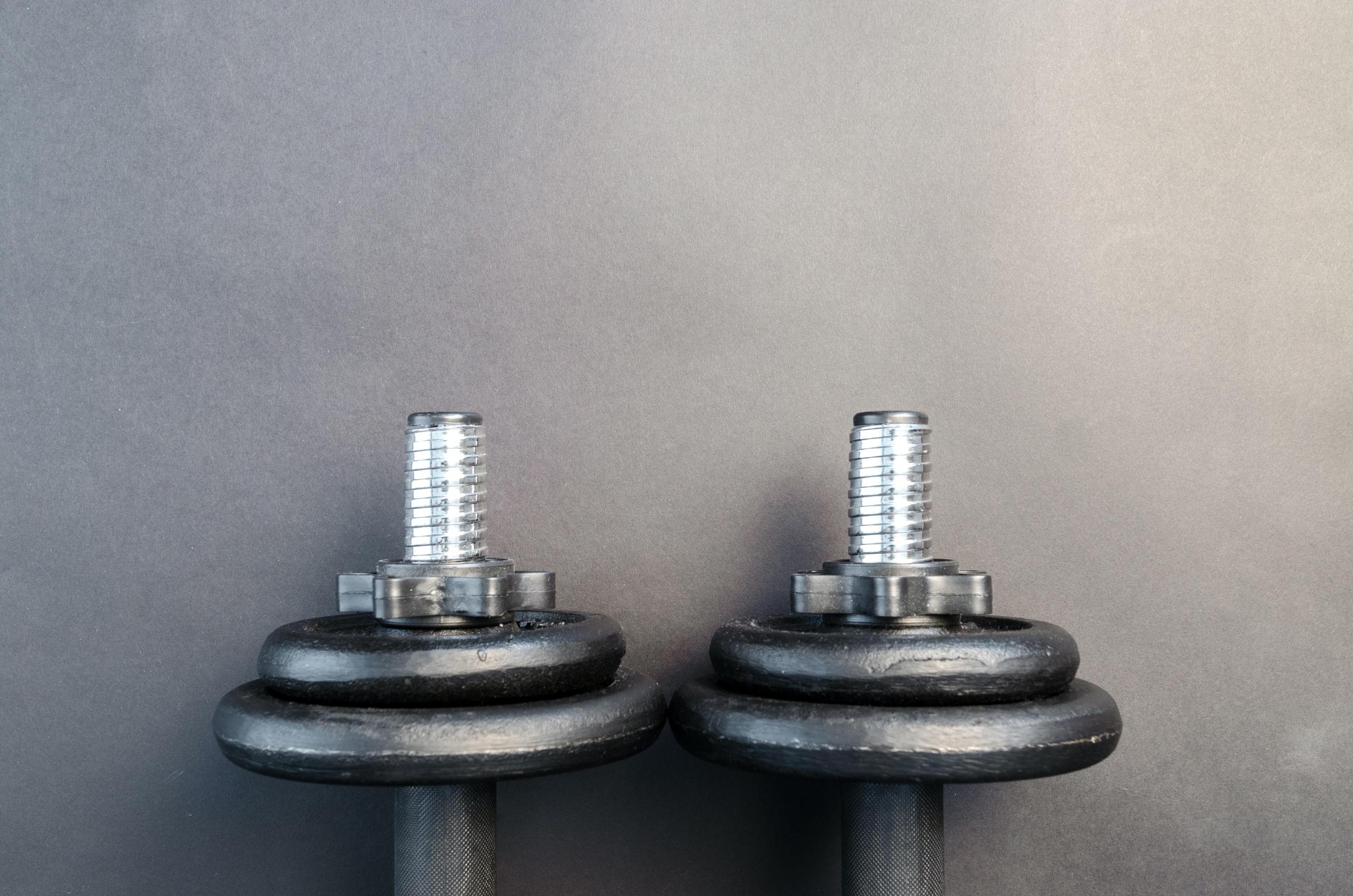two dumbbells on the floor