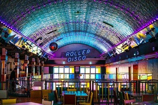 A roller disco establishment with neon lights