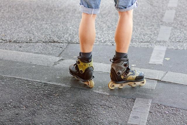 A pro skater shows off his new pair of rollerblades