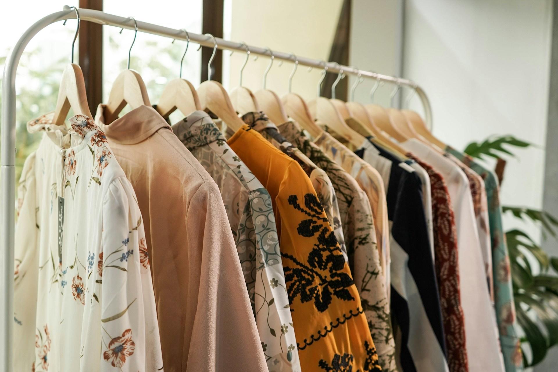Some clothes on a rack.