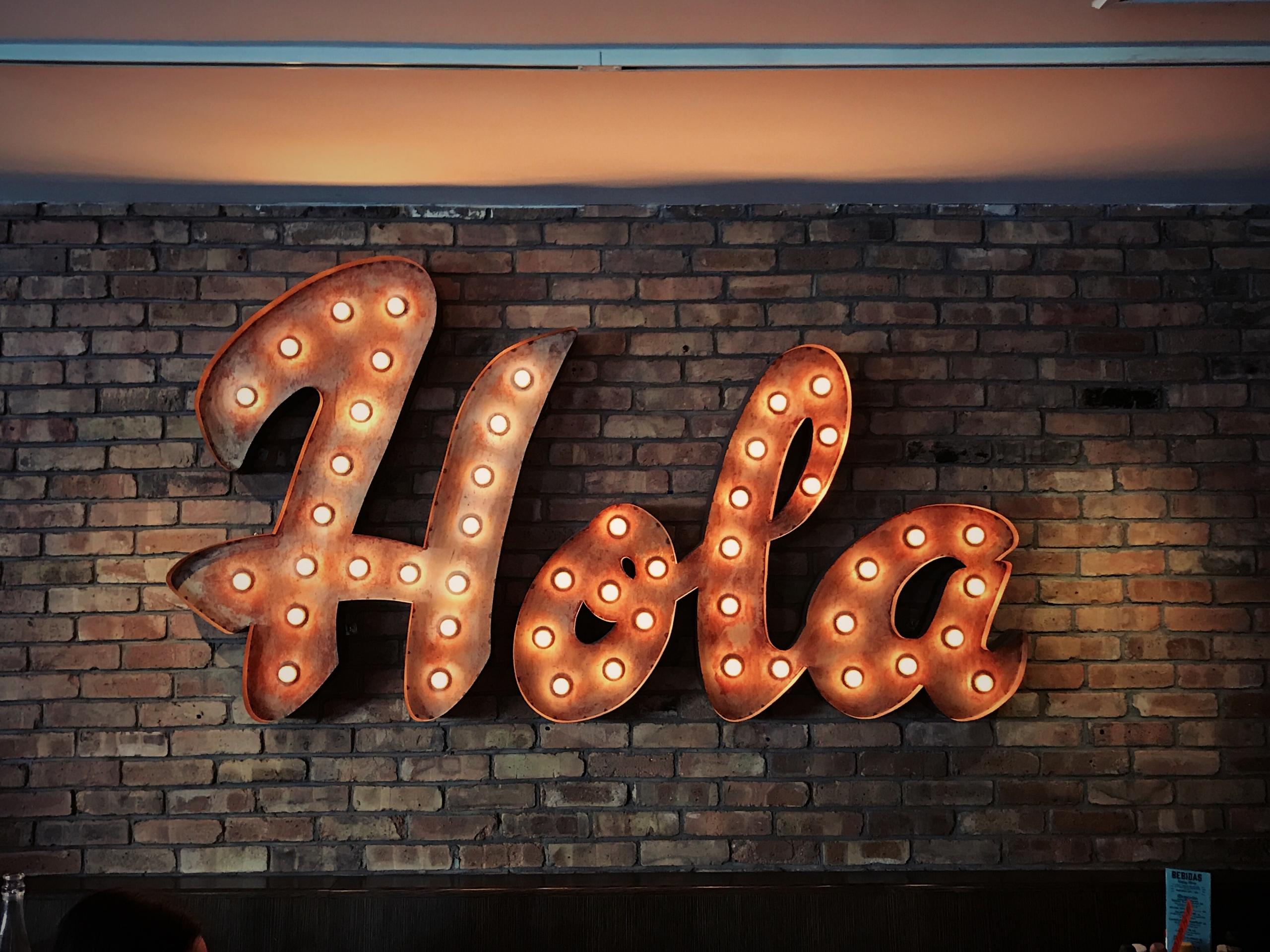 Sign that says hola