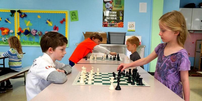 Kids playing chess