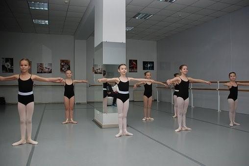 Little girls practicing ballet dance