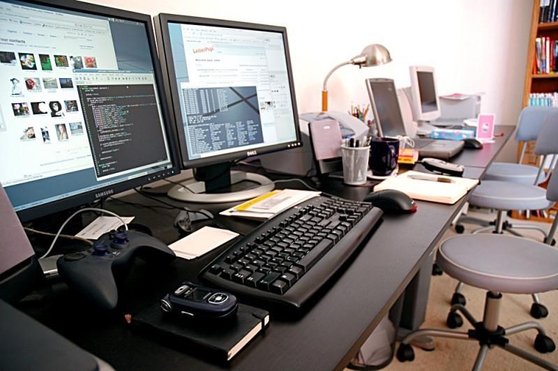 A programmer’s computer setup at home; however, most devices are obsolete now