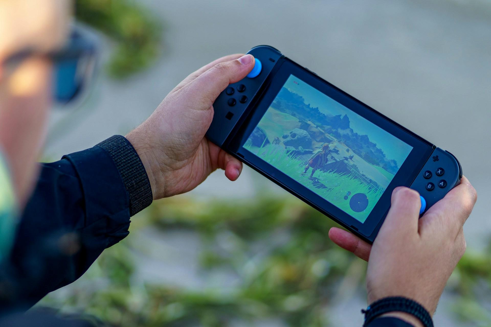 A man playing the Nintendo Switch