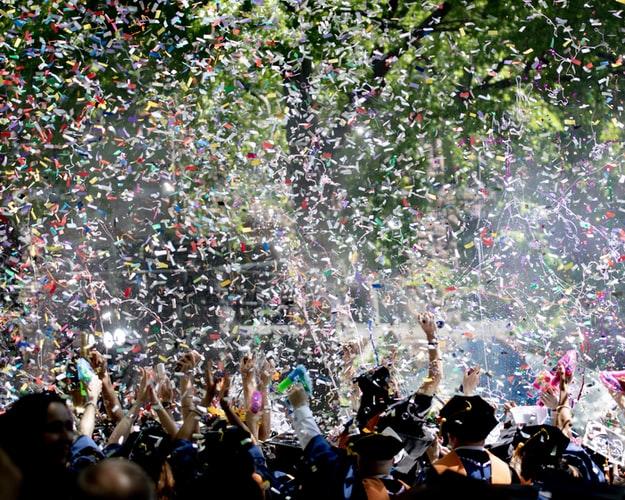 High school students celebrating graduation day.