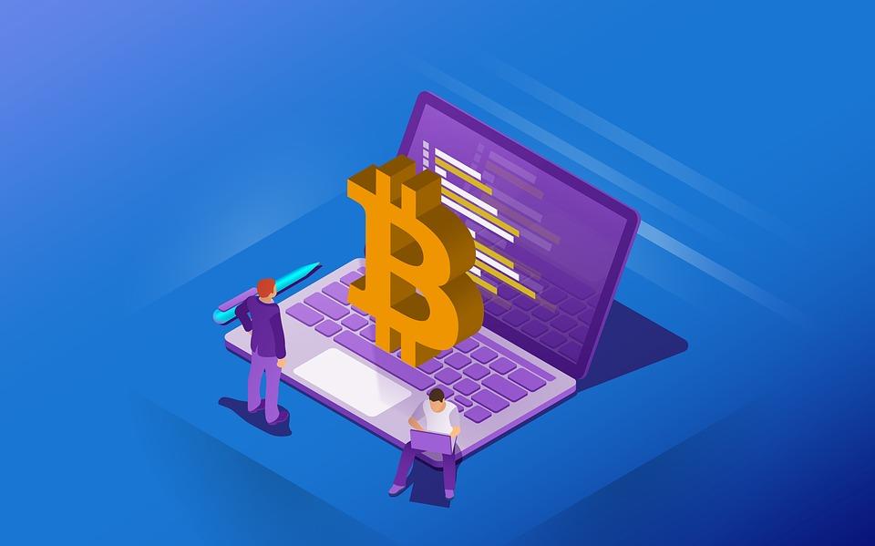 A blue background with two people, a pen, and a laptop in the middle, with the Bitcoin logo on the keyboard