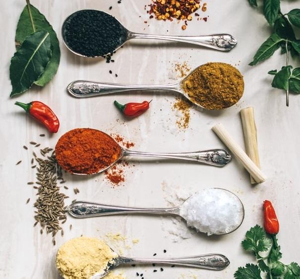Spices in spoons kept on a table