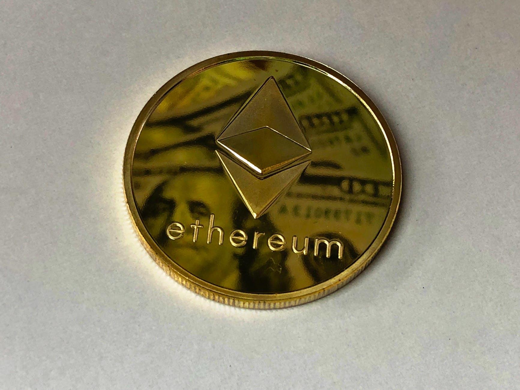 Ethereum currency laying on a flat surface