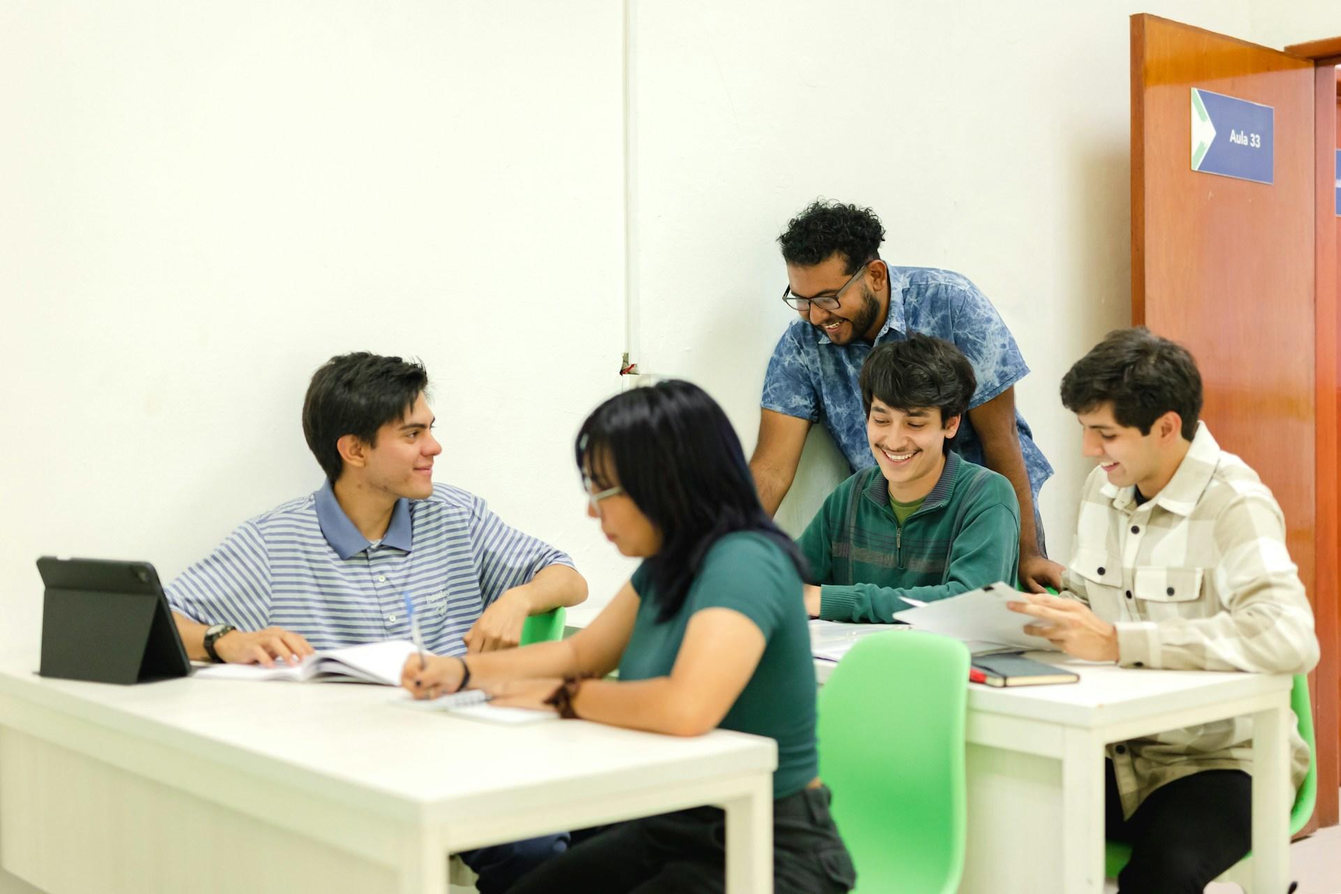 A teacher helping students during class.