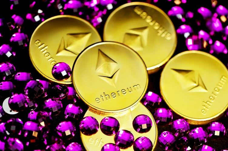 Ethereum coins covered in purple crystals