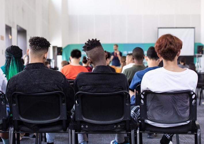 High school students listening to the lecture