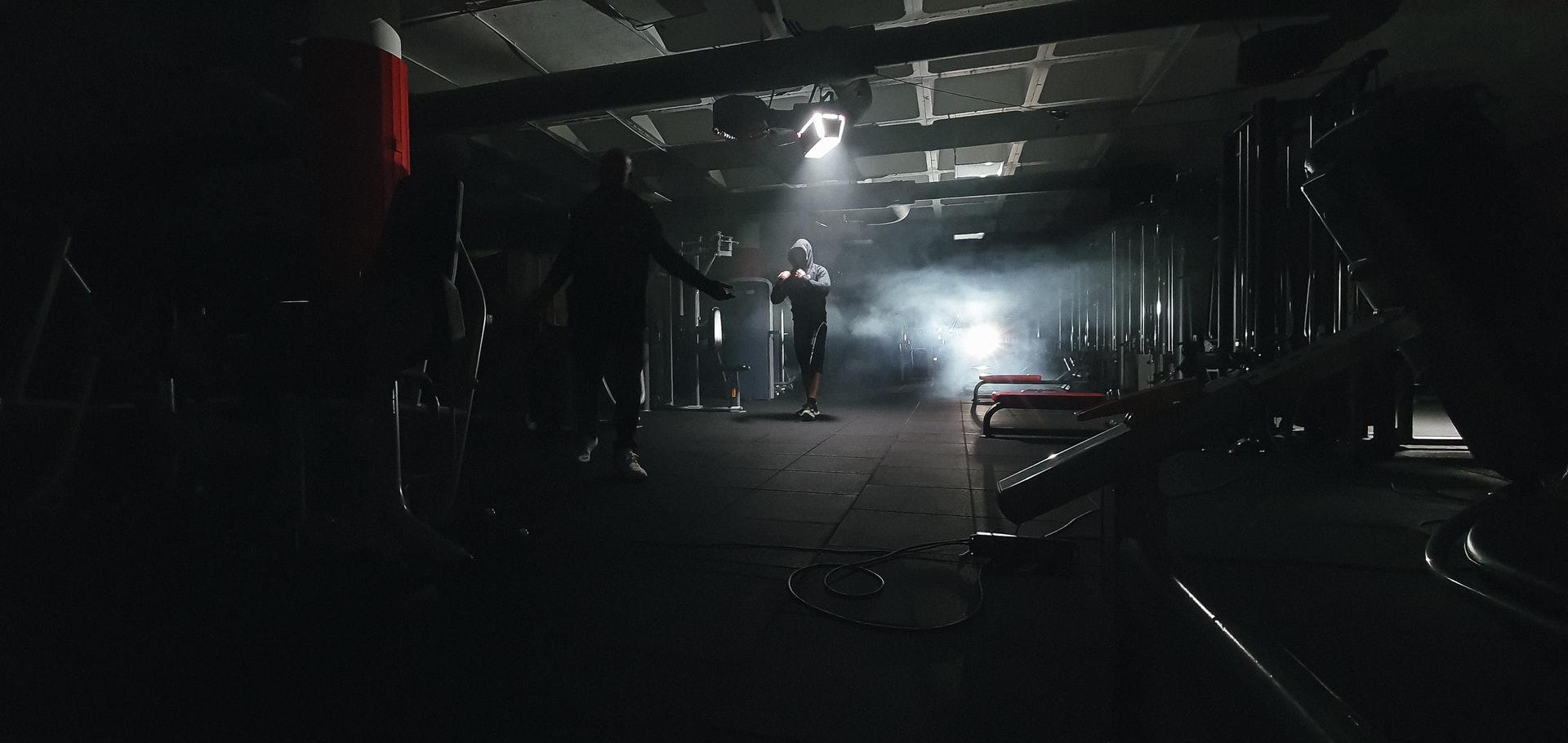 Two men training at a boxing gym