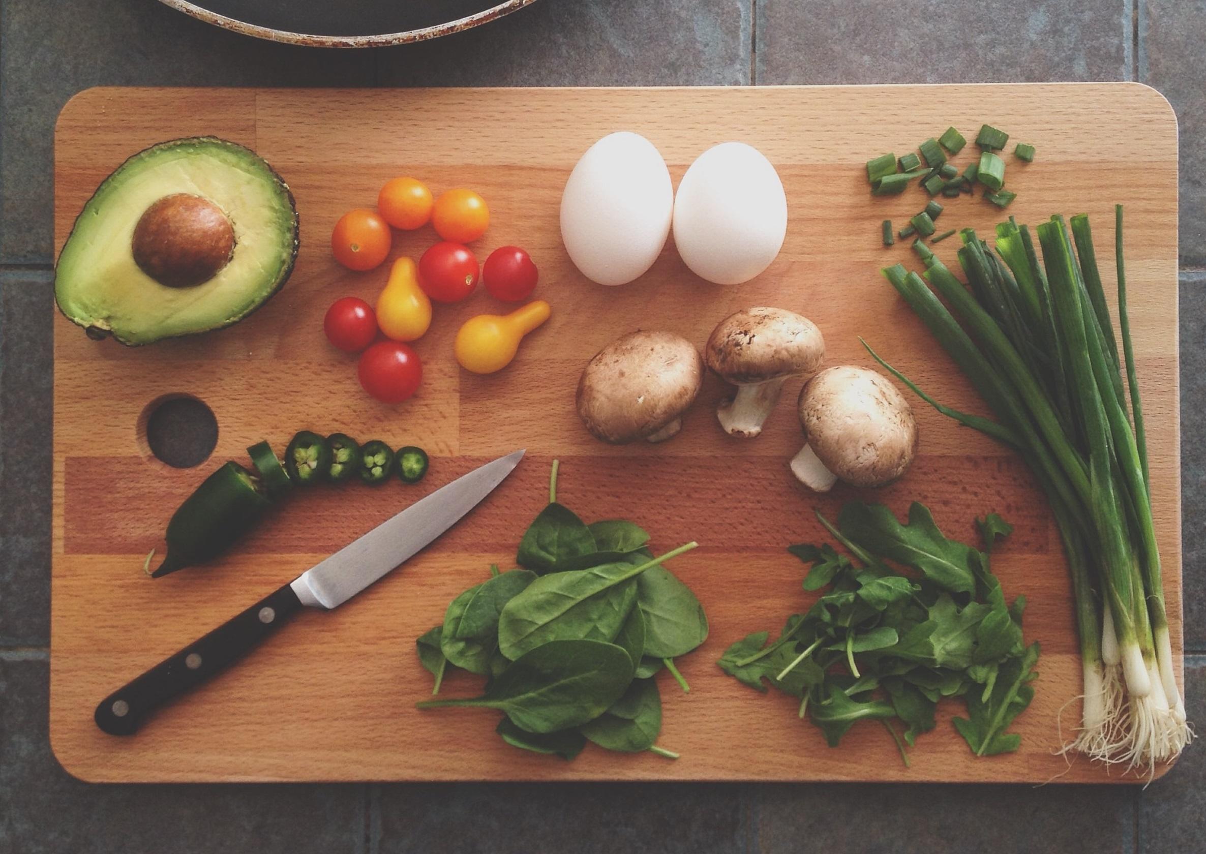 Organic vegetables and an avocado
