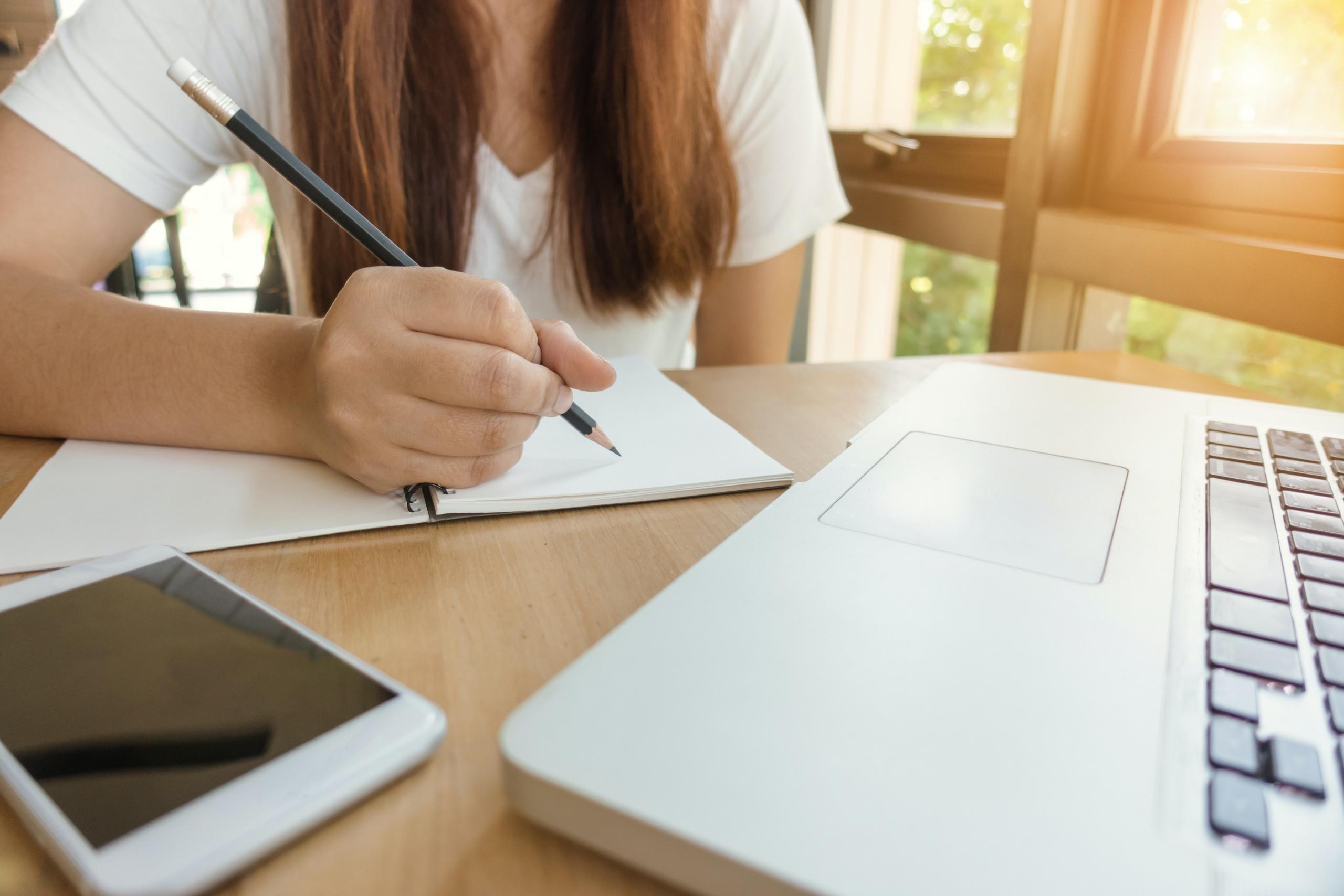 Girl studying with laptop