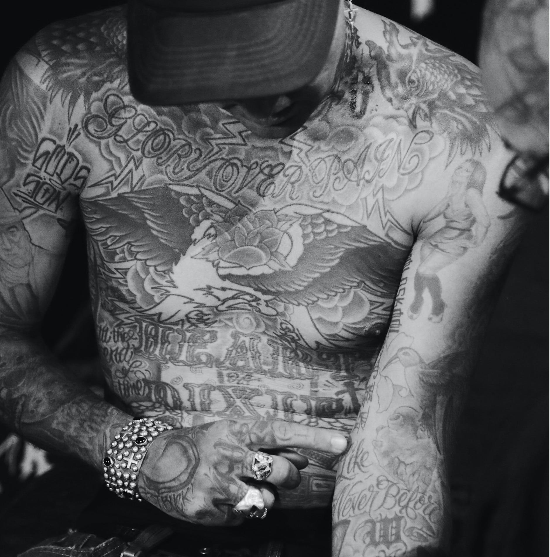 Rapper with tattoos on his body