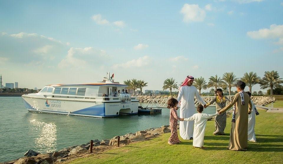 An Arab Family holding hands