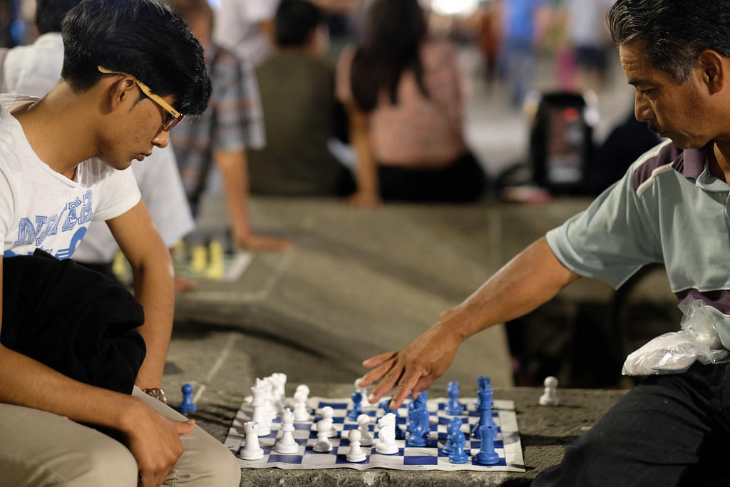 Two people playing chess