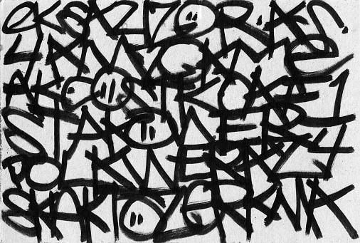 A artist expressing their chaotic emotions through graffiti